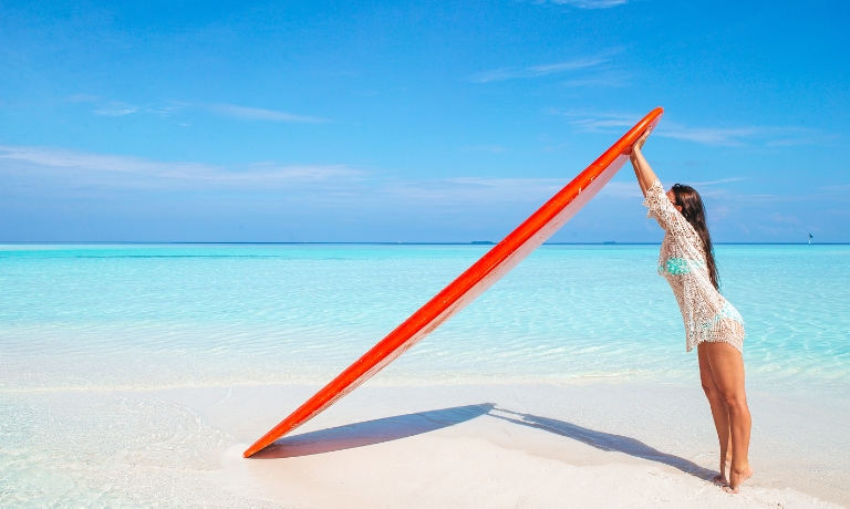 Girl holding up SUP